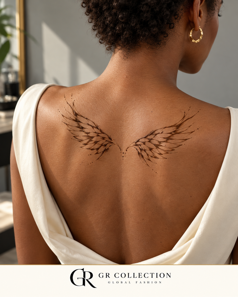 GR Collection design concept: fine sepia wing motifs across the upper back.