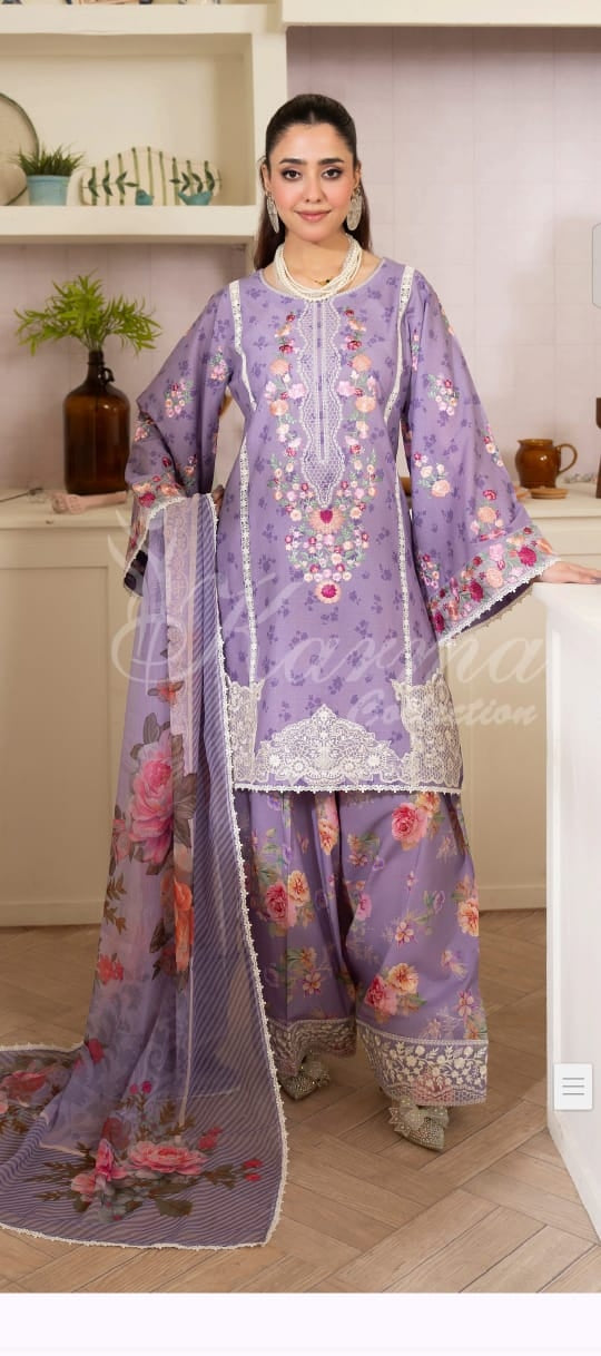 Lavender Pakistani three-piece suit with floral and lace-style details