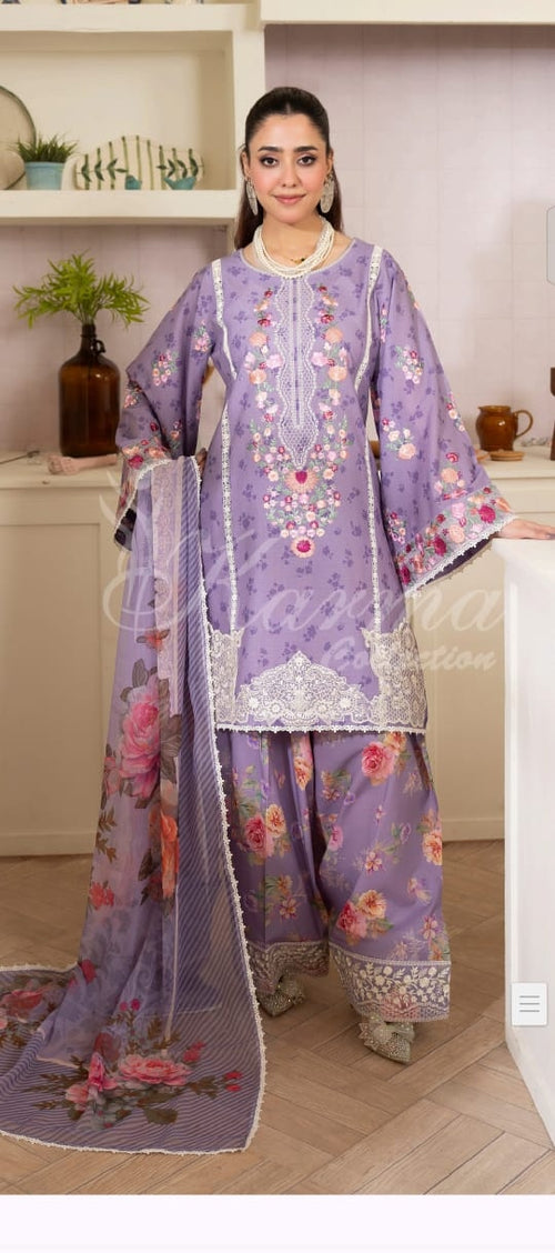 Lavender Pakistani three-piece suit with floral and lace-style details