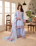 Sky blue Pakistani three-piece suit with floral details and matching dupatta