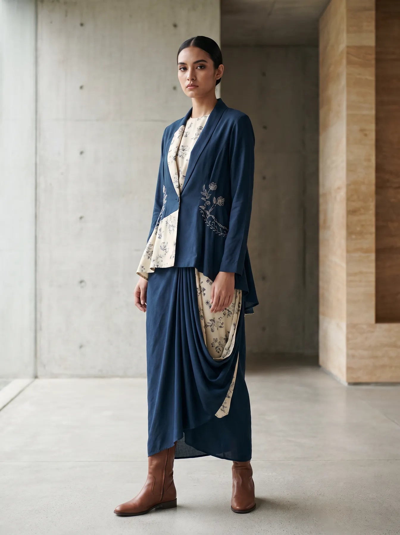 Model wearing a contemporary blue and ivory tailored fusion look